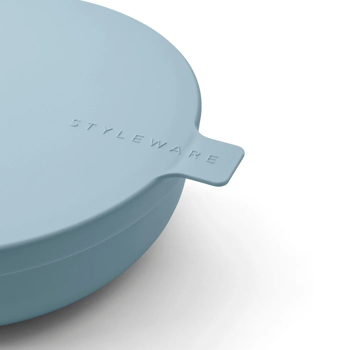 Close-up of a Styleware lid with embossed logo and pull tab